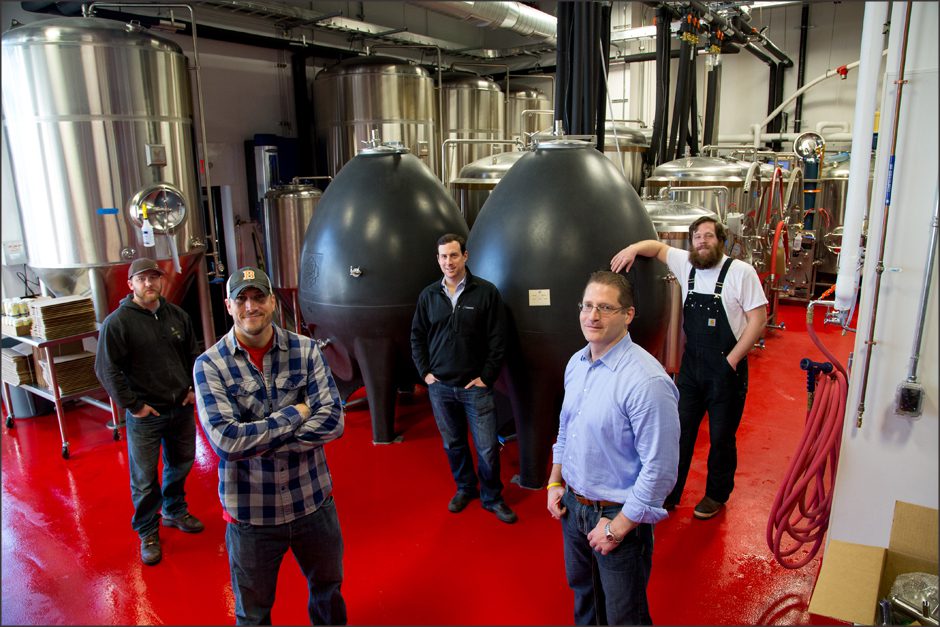 Photo/Reba Saldanha Bent Water Brewing's (from left) General Manager Eric McCormick of Marblehead, founder and head of marketing Mike Shaughnessy of Swampscott, founder and Director of Sales Chris Crawford of Marblehead, founder Aaron Reames of Swampscott and Lead Brewer John Erik Strom of Salem at their Lynn facility Friday February 19, 2016